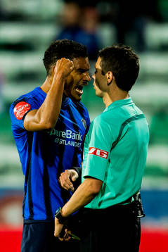 Ohikhuaeme Anthony Omoijuanfo of Stabæk reacts after receiving a yellow card by the referee Tore Hansen