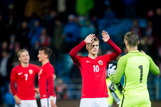 Goalkeeper Sondre Rossbach and Martin Ødegaard of Norway celebrate