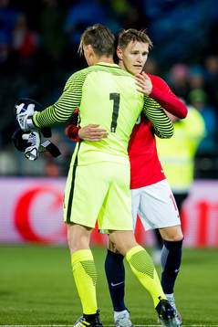 Goalkeeper Sondre Rossbach and Martin Ødegaard of Norway celebrate