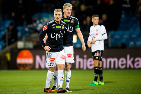 Eirik Ulland Andersen and Jakob Glesnes of Strømsgodset celebrate victory