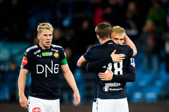 Jakob Glesnes, Marius Høibråten and Eirik Ulland Andersen of Strømsgodset celebrate victory