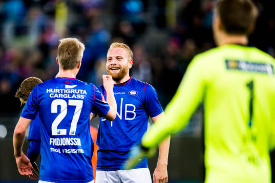 Samuel Karl Fridjonsson and Henrik Kjelsrud Johansen celebrate 5-1
