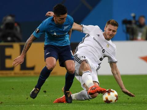  Russia. St. Petersburg. October 19, 2017. Zenit s Mathias Kranevitter and Rosenborg player Niklas Bendtner (left to right) during the UEFA Europa League group stage match between Zenit (Russia, St. Petersburg) and Rosenborg (Norway, Trondheim).  