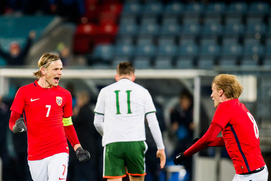 Iver Fossum of Norway celebrates with his teammate Morten Thorsby after scoring 2-1