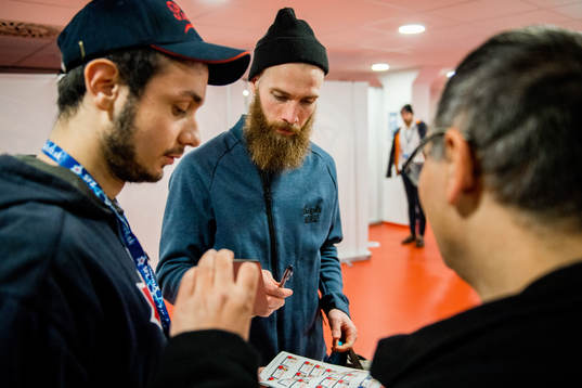 Jo Inge Berget of Norway signs autographs in the mixed zone
