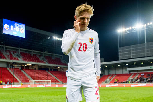Mats Møller Dæhli of Norway limps off the pitch