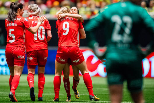 Elise Hove Thorsnes of Avaldsnes celebrates with teammates Andreia Rosa de Andrade, Cecilie Pedersen and Ingrid Ryland after scoring 1-0