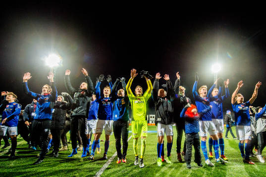 Players of Ranheim celebrate being promoted to Eliteserien