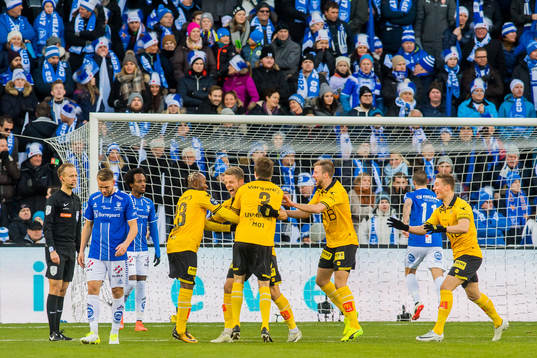 Mats Haakenstad of Lillestrøm celebrates with his teammates after scoring 2-0