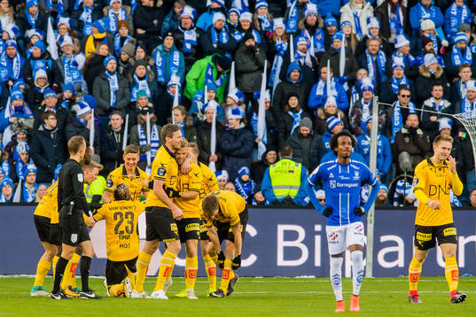 Mats Haakenstad of Lillestrøm celebrates with his teammates after scoring 2-0