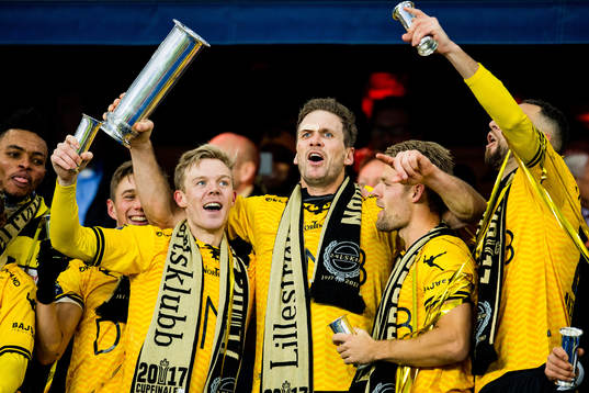 Frode Kippe of Lillestrøm lifts the cup trophy