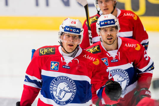 Anders Bastiansen of Norway celebrates with his teammates