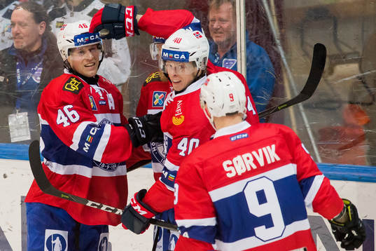 Mathis Olimb of Norway celebrates with his teammates