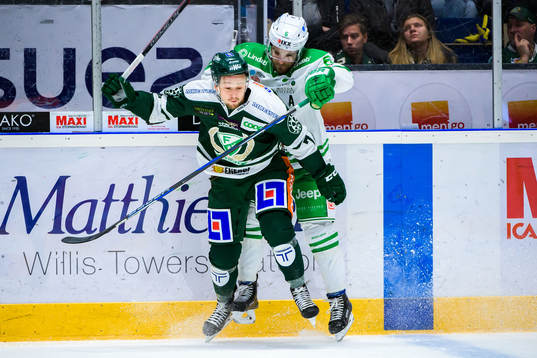 Färjestads Rasmus Asplund och Rögles Craig Schira