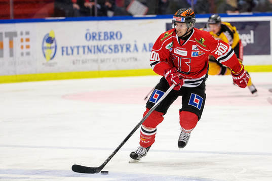 e match och spelar i en tröja med nummer 300