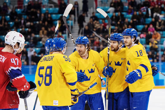 Mikael Wikstrand of Sweden celebrate with team mates