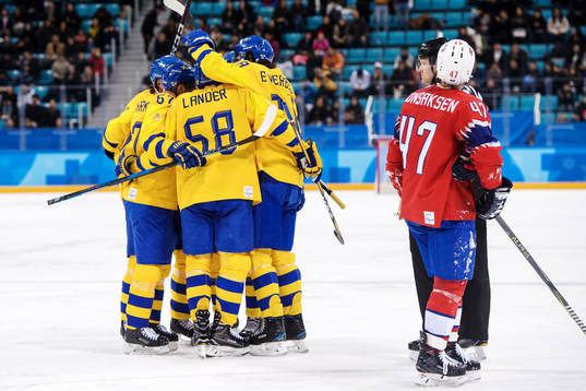 Mikael Wikstrand of Sweden celebrate with team mates
