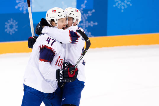 Aleksander Bonsaksen of Norway celebrates with Mats Rosseli