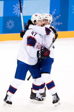 Aleksander Bonsaksen of Norway celebrates with Mats Rosseli