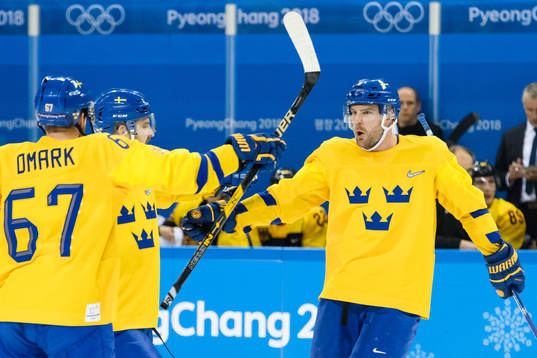 Linus Omark, Mikael Wikstrand and Patrik Hersley of Sweden