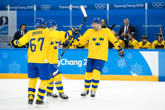 Linus Omark, Mikael Wikstrand and Patrik Hersley of Sweden