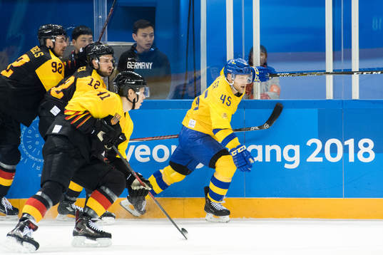 Marcel Noebels, Brooks Macek and Jonas Müller of Germany