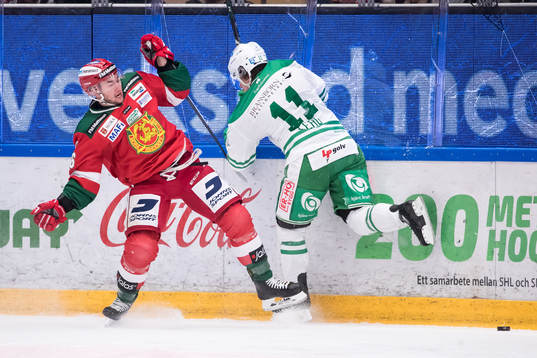 Moras Jason Akeson  och Rögles Bryan Lerg  i