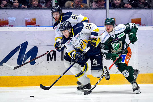 s Stefan Elliott och Kevin Stenlund och Färjestads Libor