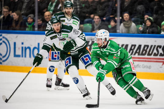Rögles Stephen Perfetto och Färjestads Per Åslund