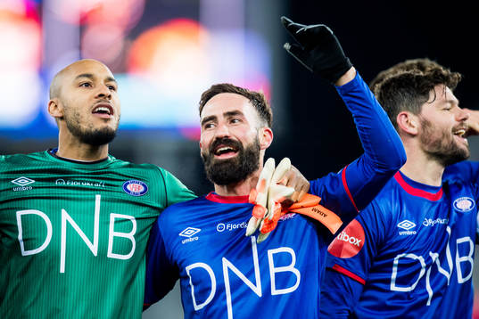 Goalkeeper Adam Larsen Kwarasey, Magnus Lekven and Daniel Fredheim Holm of Vålerenga celebrate