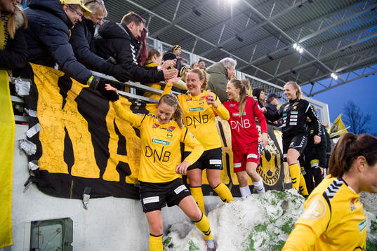 Goalkeeper Cecilie Fiskerstrand and Anna Westerlund of LSK Kvinner celebrate with the supporters