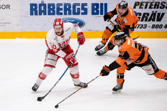 Timrås Johan Persson och Karlskronas Cory Murphy