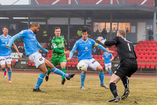 Erixon Danso of Sandnes Ulf scores 1-2 behind goalkeeper Egil Selvik of Nest-Sotra