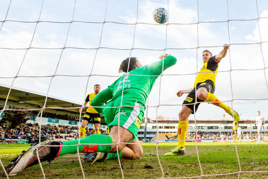 Goalkeeper Marko Maric and Frode Kippe of Lillestrøm clear the ball on the line