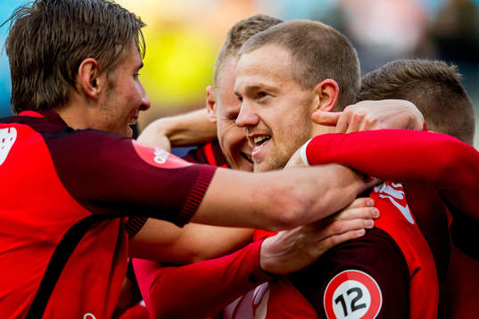 Peter Orry Larsen of Brann celebrates with teammate Steffen Lie Skålevik after scoring 0-1