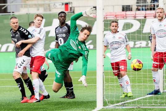 Goalkeeper Håvar Grøntvedt Jensen of Fredrikstad as Tobias Lauritsen of Odd (not pictured) scores 2-0