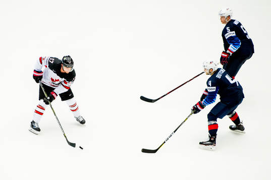 Jaden Schwartz of Canada, Will Butcher of USA and Connor