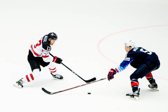 Matt Barzal of Canada and Connor Murphy of USA