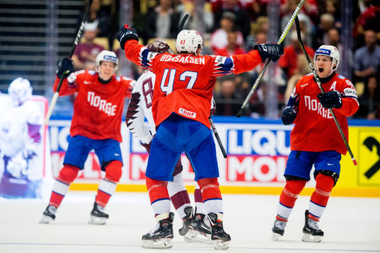 Alexander Bonsaksen of Norway celebrates with teammate
