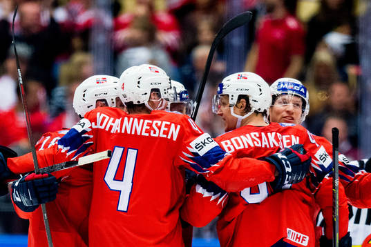 Alexander Bonsaksen of Norway celebrates with teammates