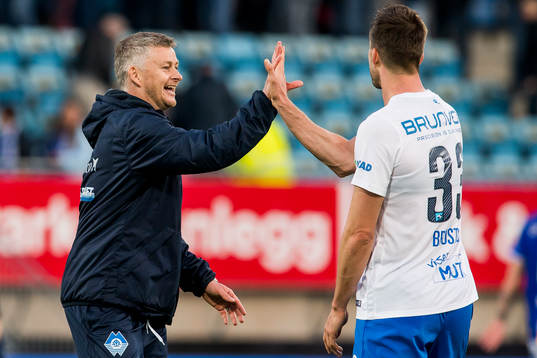 Ole Gunnar Solskjær, manager of Molde, and Fredrik Brustad of Molde celebrate