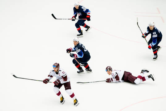 Roberts Bukarts of Latvia, Dylan Larkin of USA, Cam