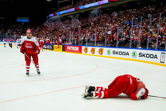 Oliver Lauridsen of Denmark lies down with an injury