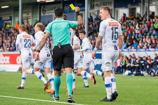 Erik Tønne of Ranheim is shown a yellow card