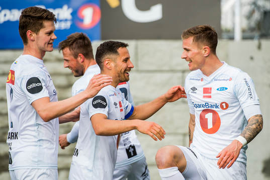 Erik Tønne of Ranheim celebrates with Christian Rismark and Mads Reginiussen after scoring 0-1