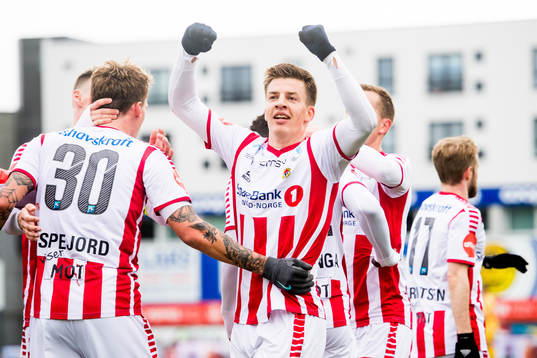 Runar Espejord and Jostein Gundersen of Tromsø celebrate the 0-1 goal with teammates