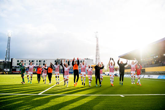 Players of Tromsø celebrate