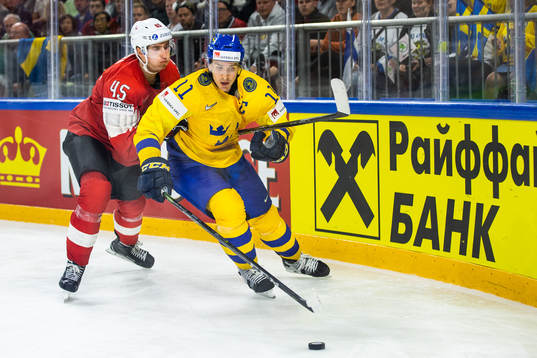 Schweiz Michael Fora och Sveriges Mikael Backlund i kamp om