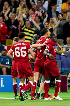 Sadio Mané celebrates with Georginio Wijnaldum, Trent