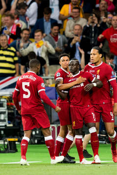 Sadio Mané celebrates with Georginio Wijnaldum, Trent